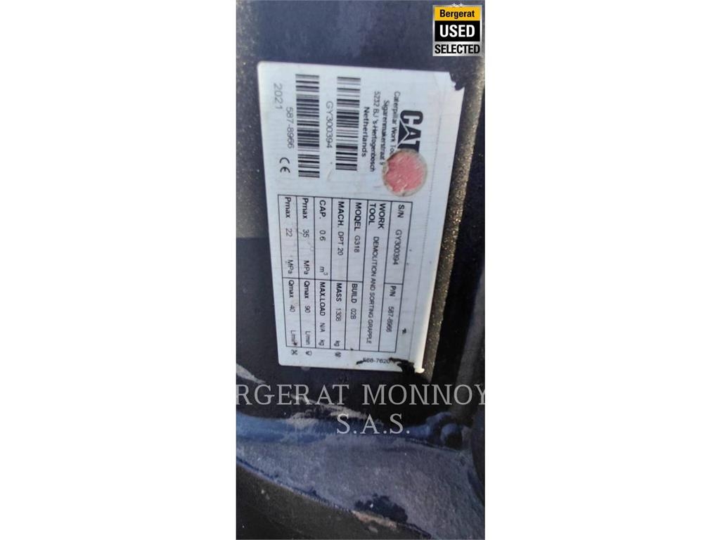 CAT MH3024 حفارات بعجل