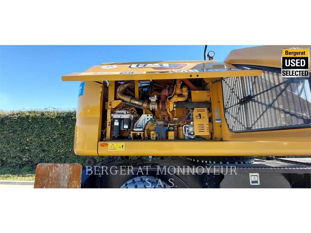 CAT MH3024 حفارات بعجل