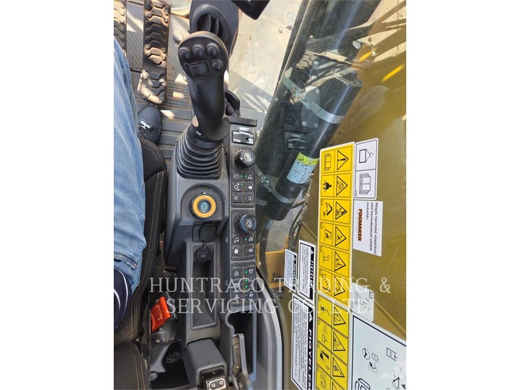 CAT MH3024-07 حفارات بعجل