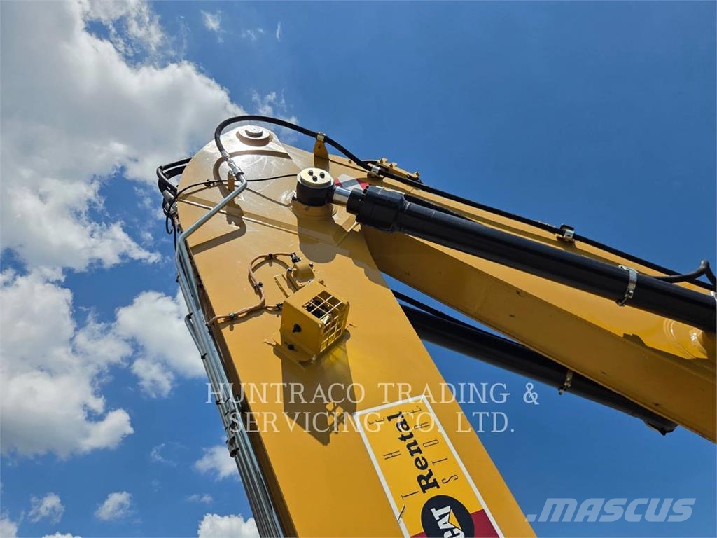 CAT MH3024-07 حفارات بعجل