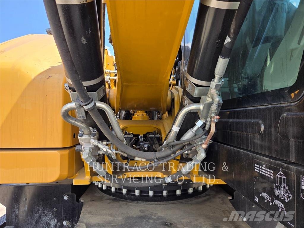 CAT MH3024-07 حفارات بعجل