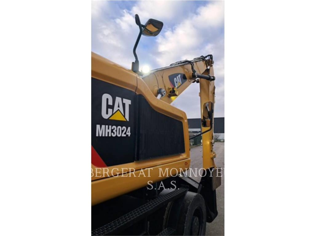 CAT MH3024-1 Pelle sur pneus