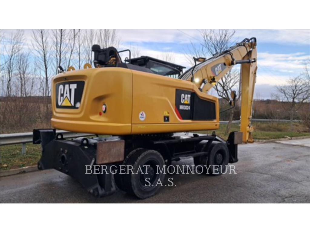 CAT MH3024-1 Pelle sur pneus