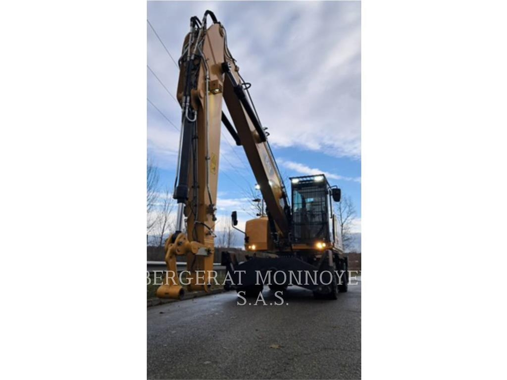 CAT MH3024-1 Pelle sur pneus