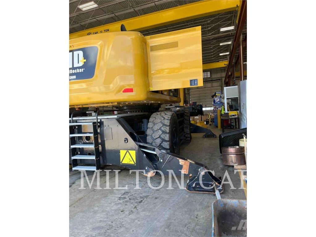 CAT MULTIDOCKER CH600 Багери за разрушаване
