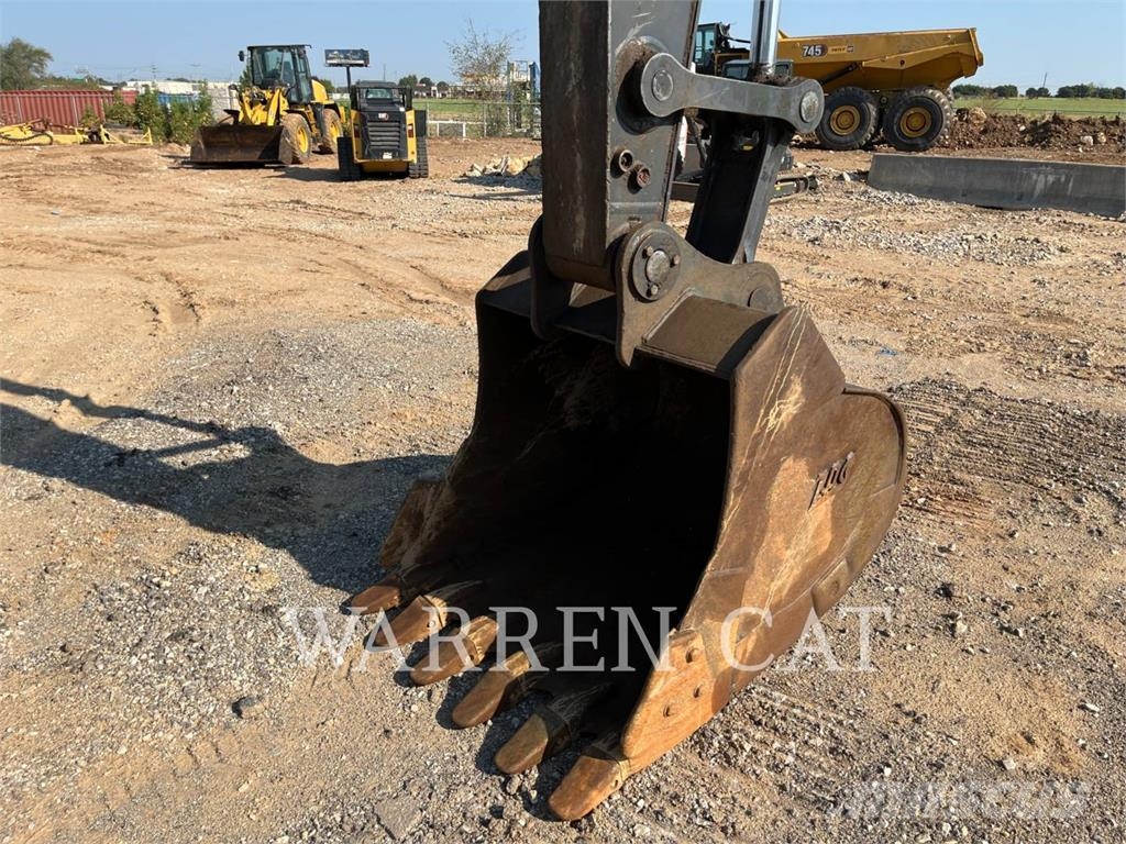 John Deere 210 لوادر ذات جرافات عكسية