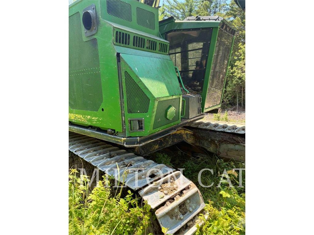 John Deere 853M Валочно-пакетувальні машини