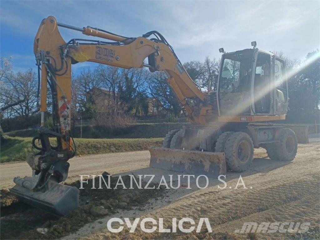 Liebherr U-A309 حفارات بعجل