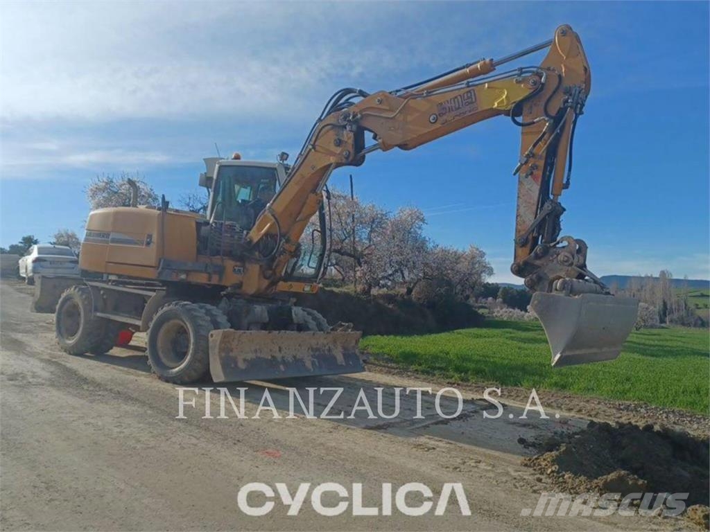 Liebherr U-A309 حفارات بعجل