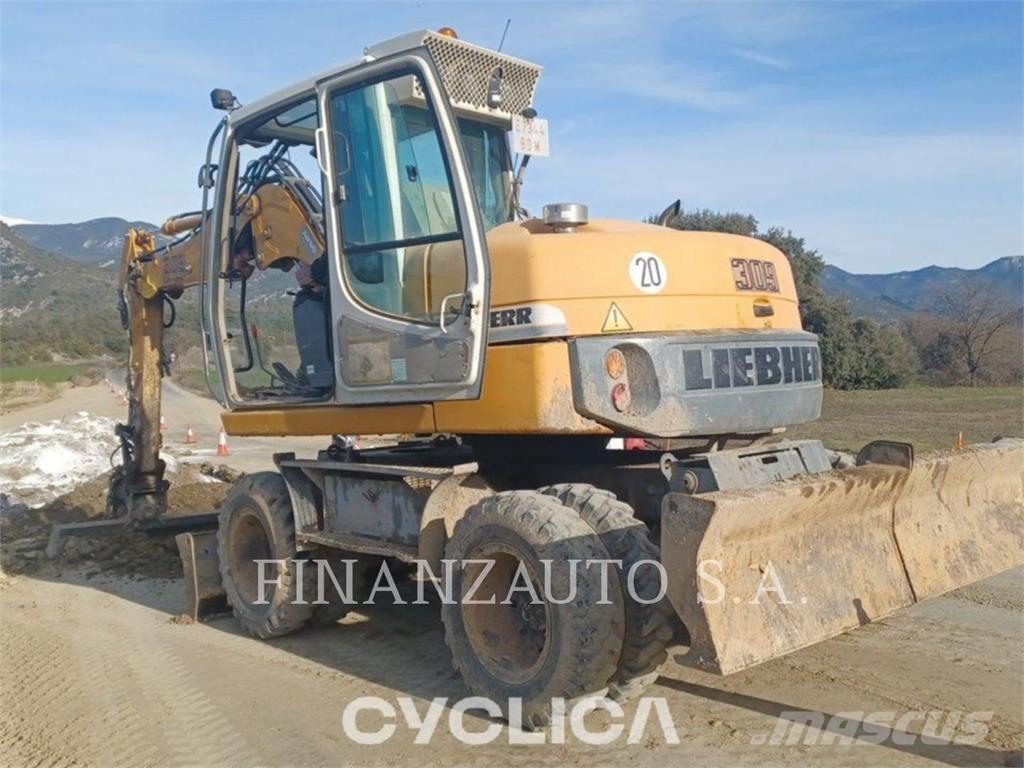 Liebherr U-A309 حفارات بعجل