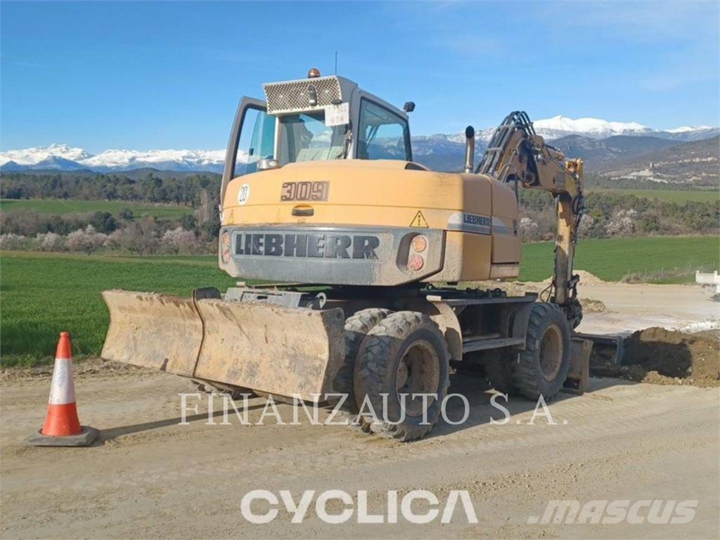 Liebherr U-A309 حفارات بعجل