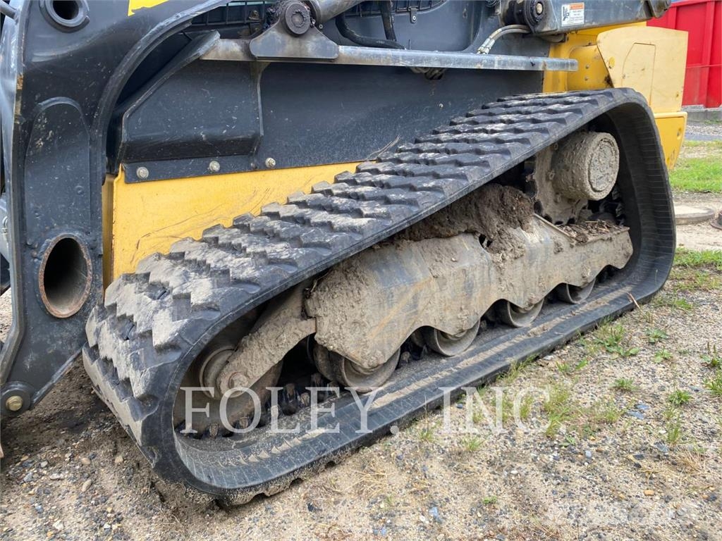 New Holland C238 Kāpurķēžu iekrāvēji