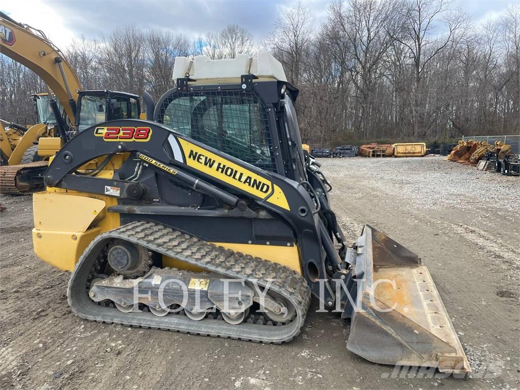 New Holland C238 Kāpurķēžu iekrāvēji