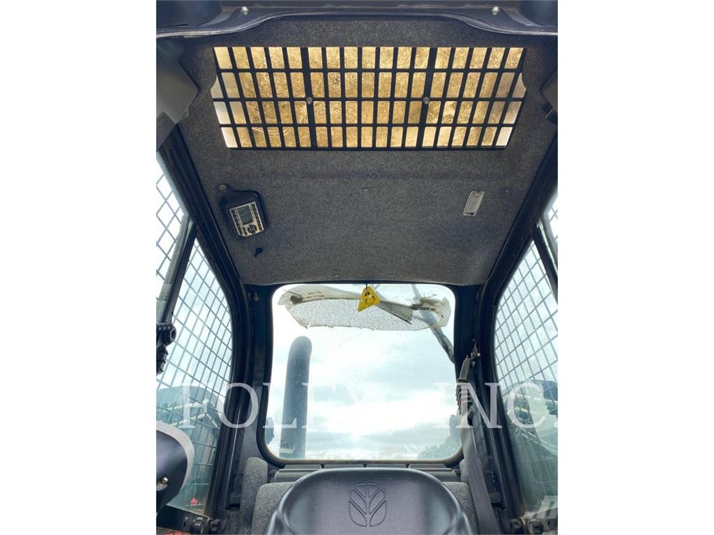 New Holland C238 Kāpurķēžu iekrāvēji