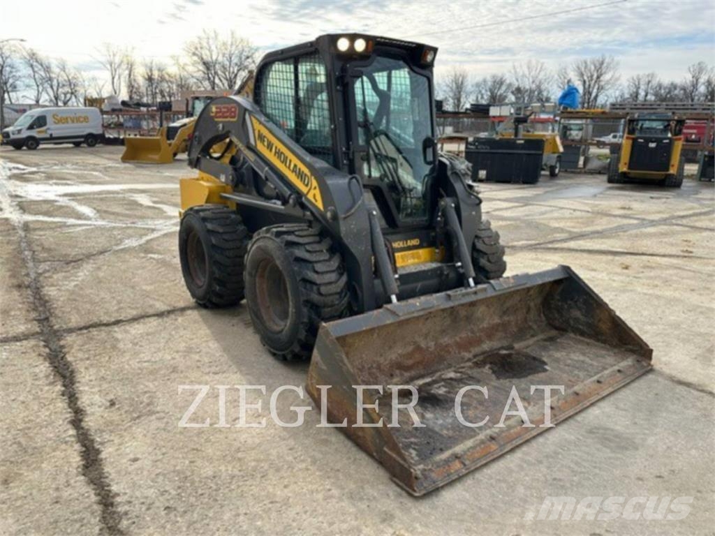 New Holland L228 لوادر انزلاقية التوجيه