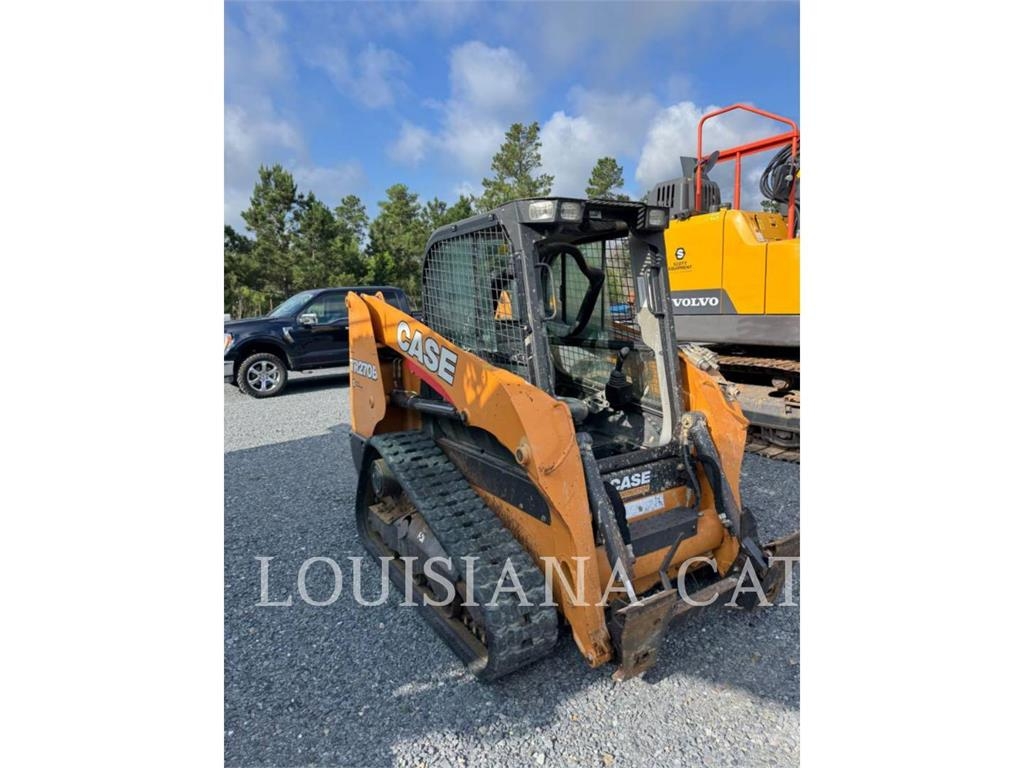 New Holland TR270B لوادر انزلاقية التوجيه