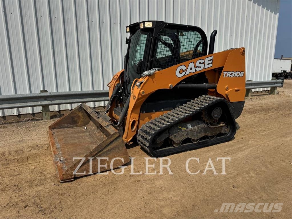 New Holland TR310B لوادر زحافة