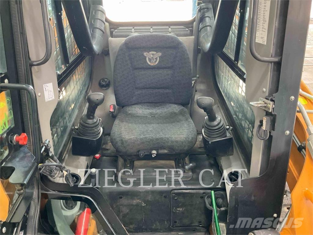 New Holland TR310B لوادر زحافة