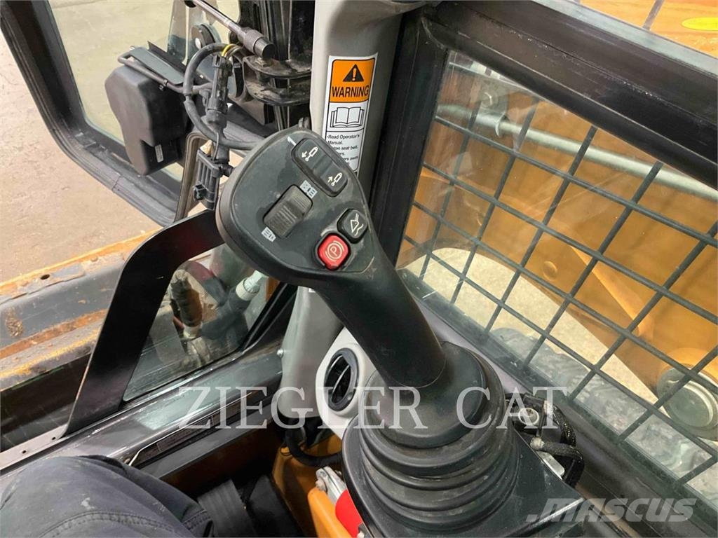 New Holland TR310B لوادر زحافة