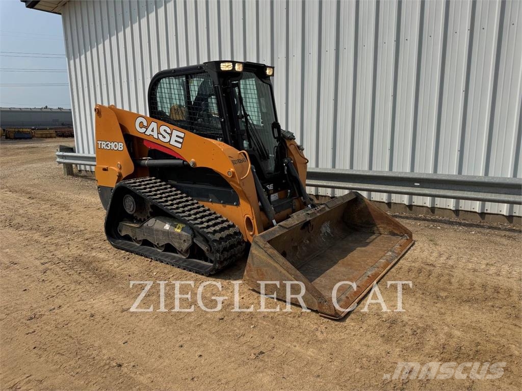 New Holland TR310B لوادر زحافة