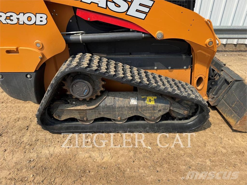 New Holland TR310B لوادر زحافة