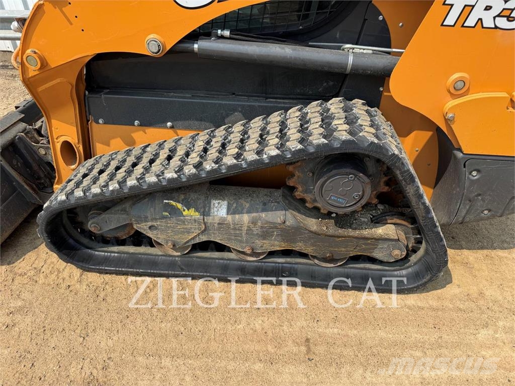 New Holland TR310B لوادر زحافة