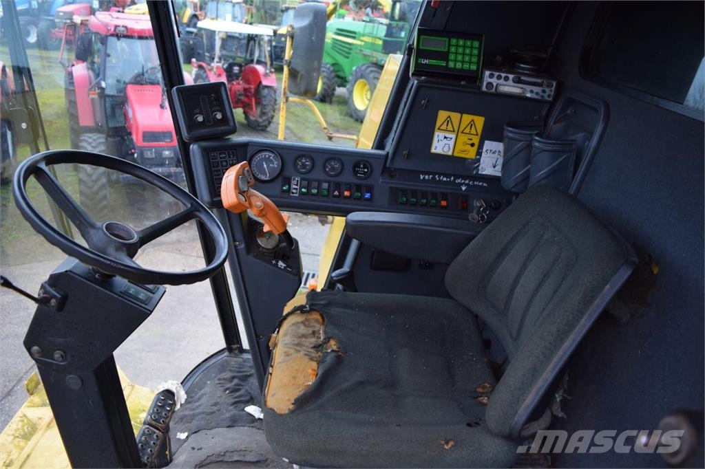 New Holland TC 56 Kombajni
