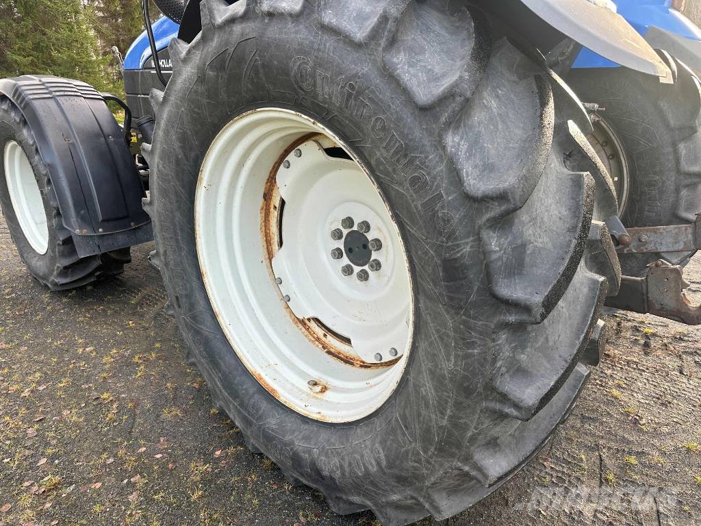 New Holland TS 115 الجرارات