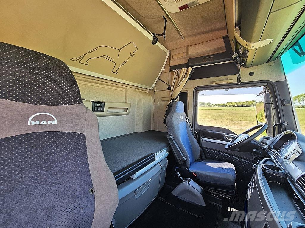 MAN 26.500 TGX XXL 6X2-4 INTARDER Rol kiper kamioni sa kukom za podizanje tereta