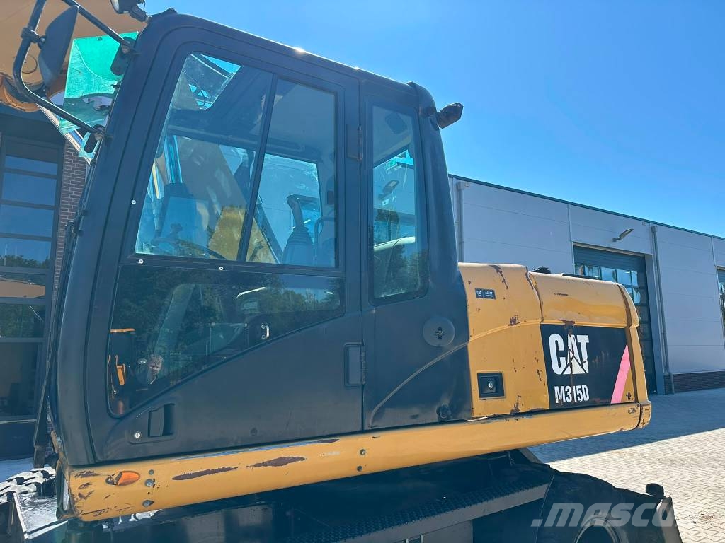 CAT M 315 D + ROTOTILT Ratiniai ekskavatoriai