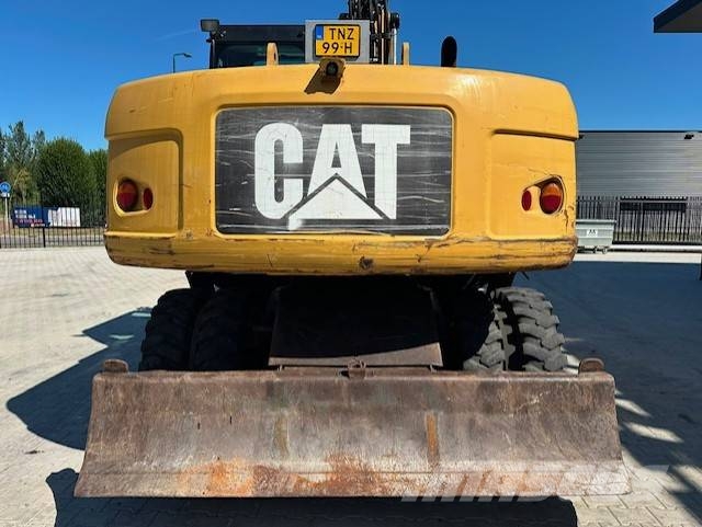 CAT M 315 D + ROTOTILT Ratiniai ekskavatoriai