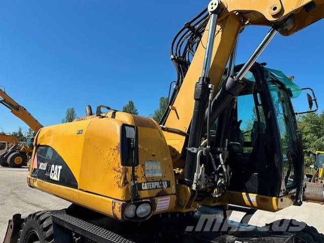 CAT M 315 D + ROTOTILT Ratiniai ekskavatoriai