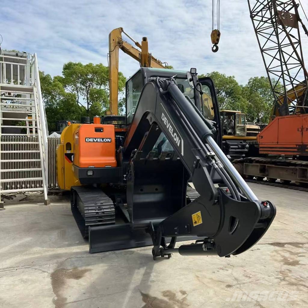 Develon DX 60 D Bagri goseničarji