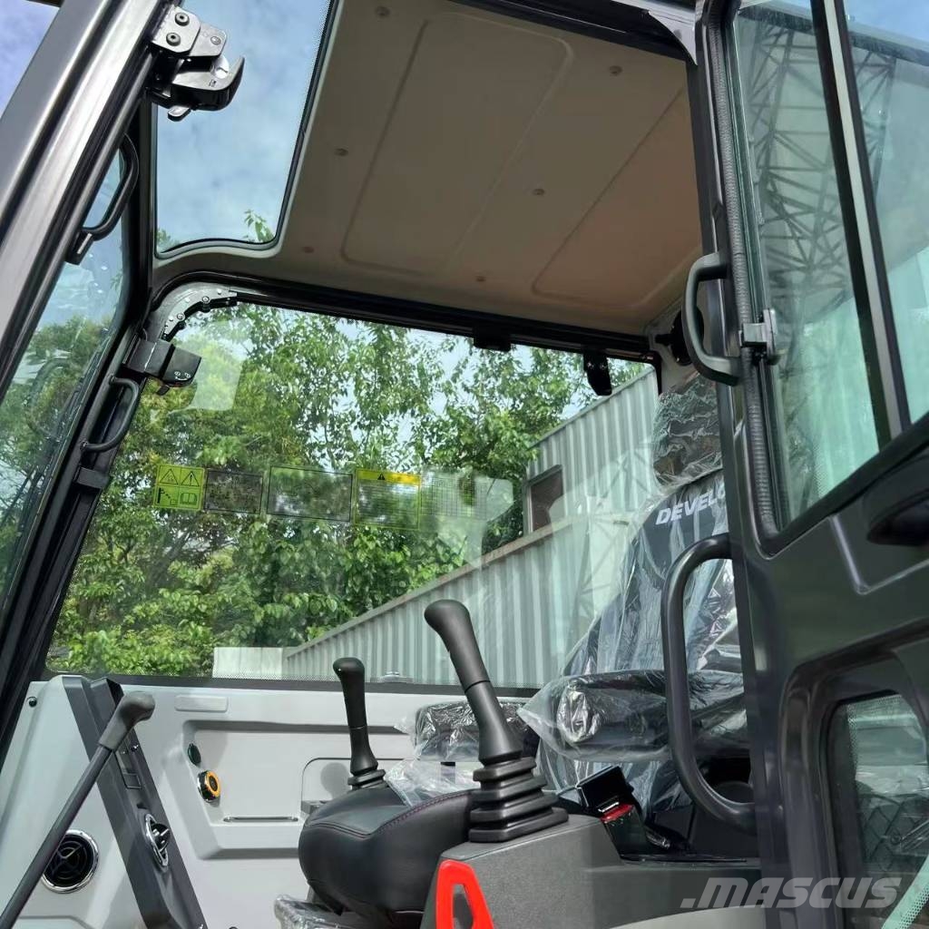 Develon DX 60 D Bagri goseničarji