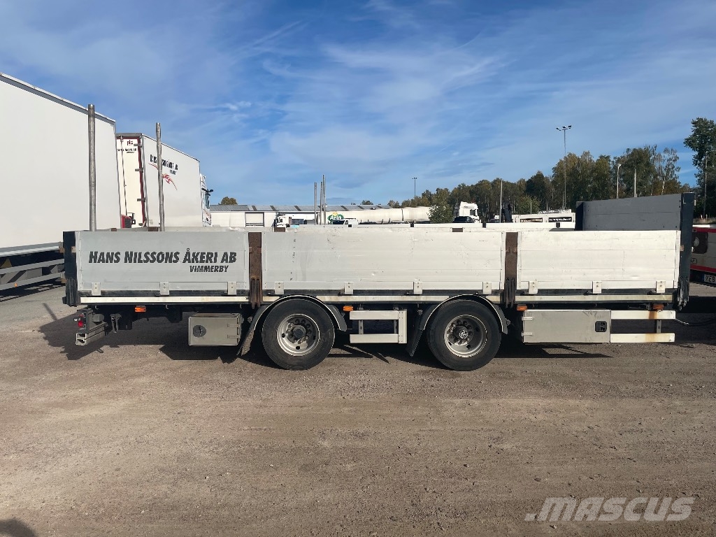 MAN TGX 33.560 6x4 BLS Camioane platforma/prelata