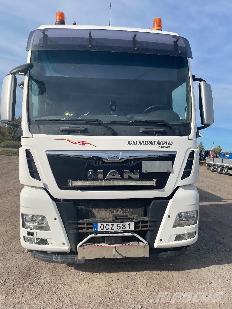 MAN TGX 33.560 6x4 BLS Camioane platforma/prelata