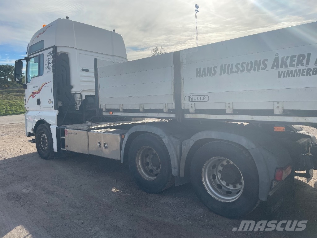 MAN TGX 33.560 6x4 BLS Camioane platforma/prelata