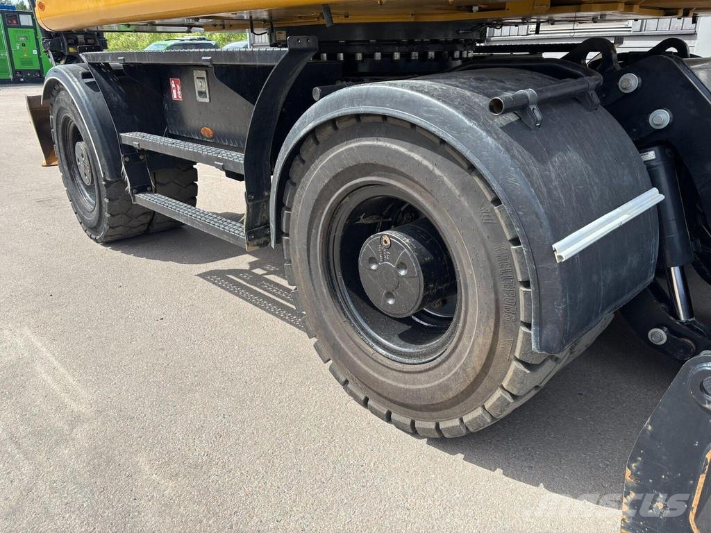 CAT M317 Ratiniai ekskavatoriai
