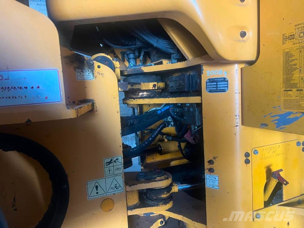 Hyundai HL 770-7 A لوادر بعجل