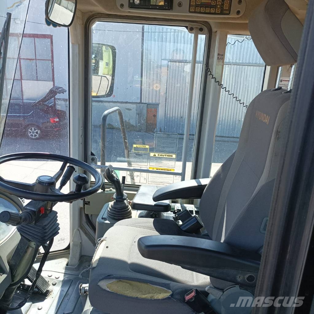 Hyundai HL 770-7 A لوادر بعجل