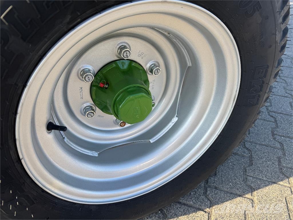 Krone Comprima F 125 XC محزمات مستديرة