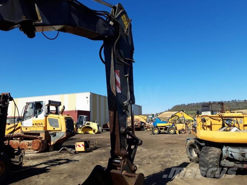 Volvo L 180 أذرع الغطاس