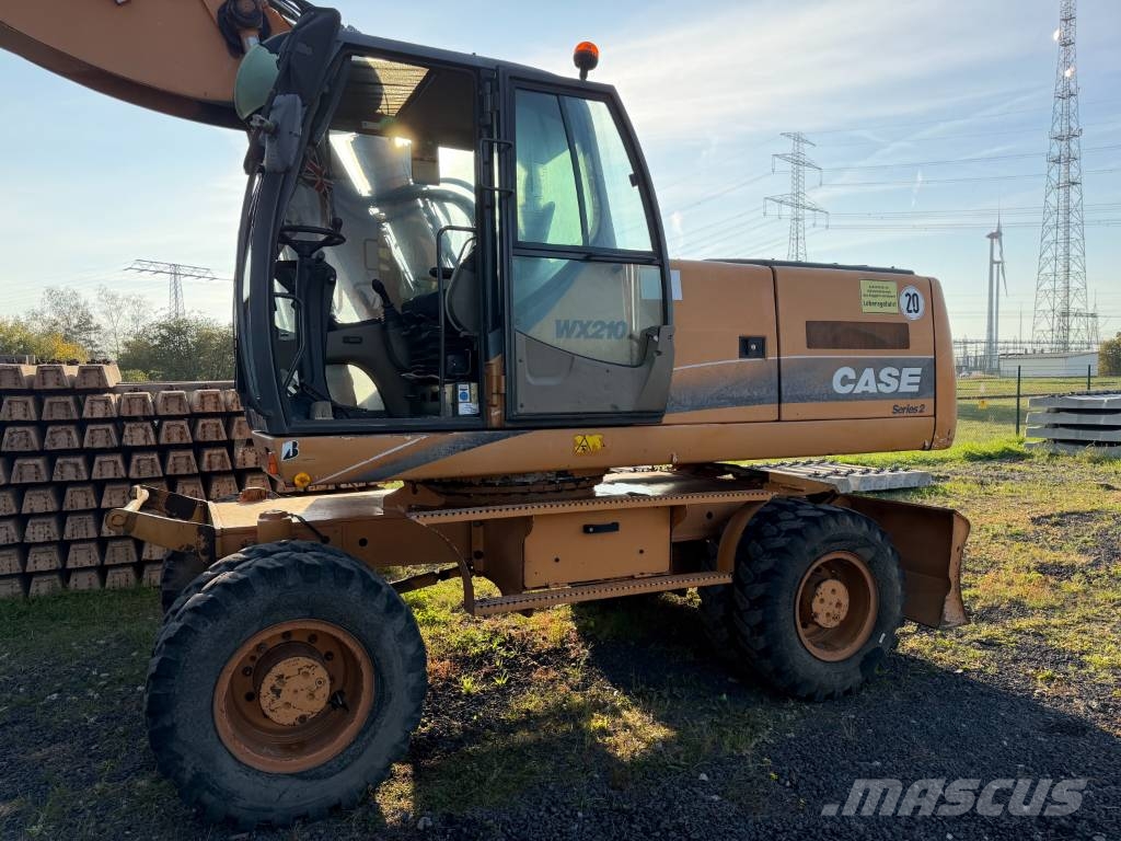 CASE WX 210 Pelle sur pneus
