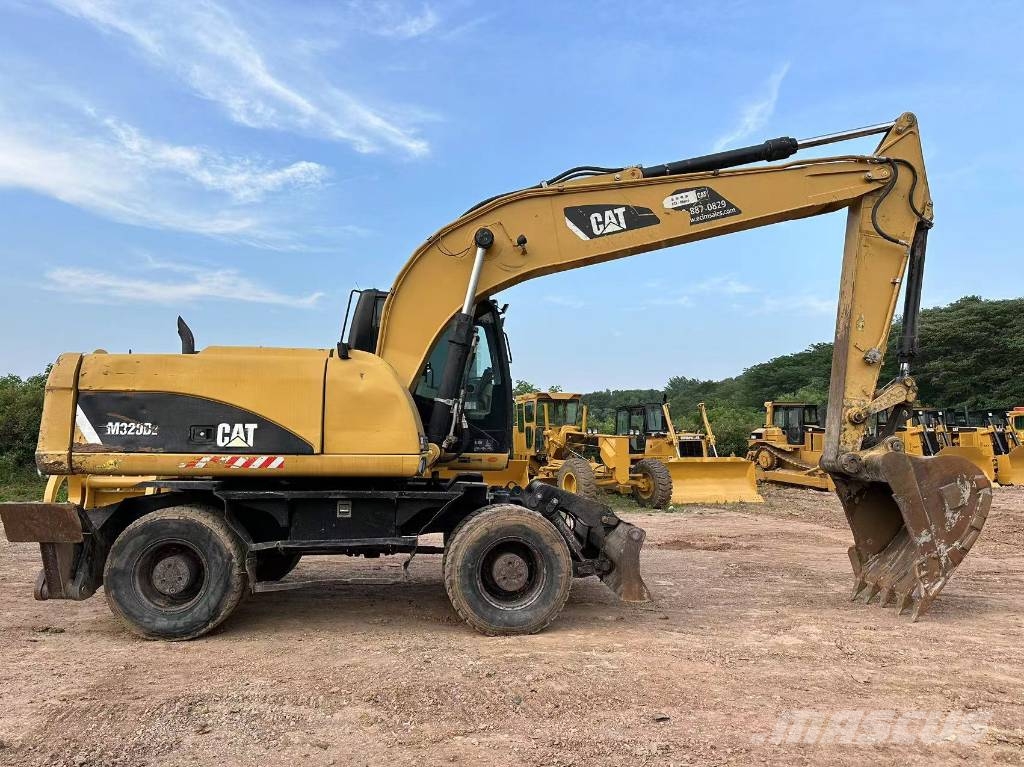 CAT M320D wheel excavator Pelle sur pneus