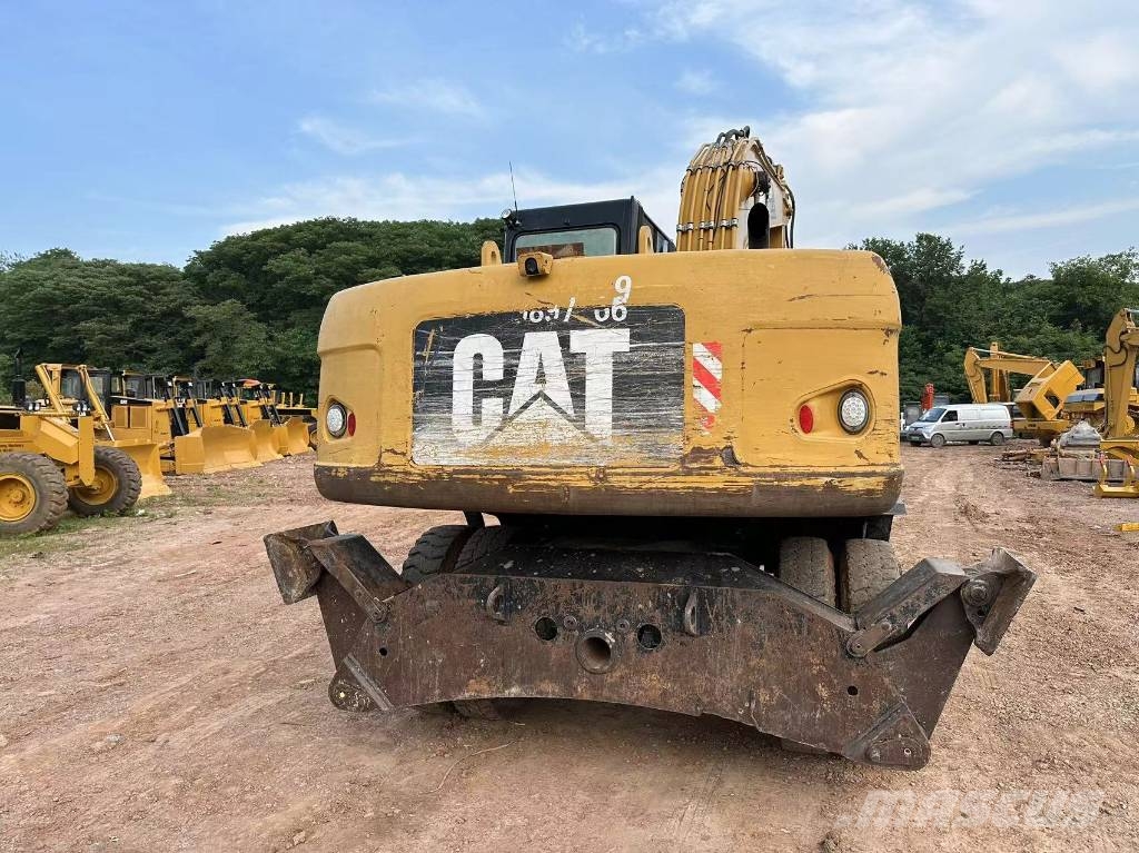 CAT M320D wheel excavator Pelle sur pneus