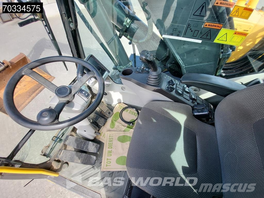 Volvo EW140 D Outriggers + Blade Колісні екскаватори