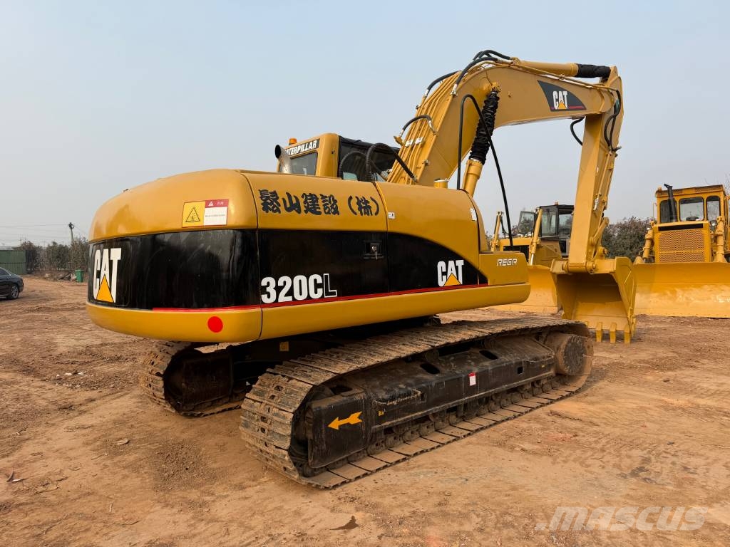 CAT 320 Гусеничні екскаватори