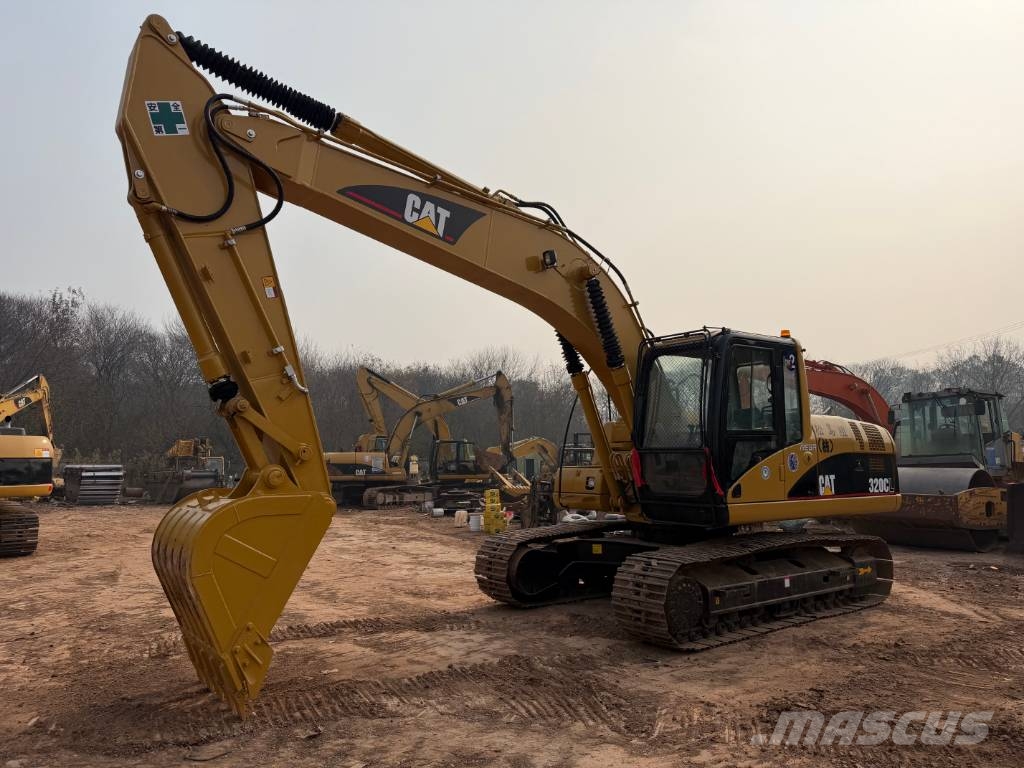 CAT 320 Гусеничні екскаватори