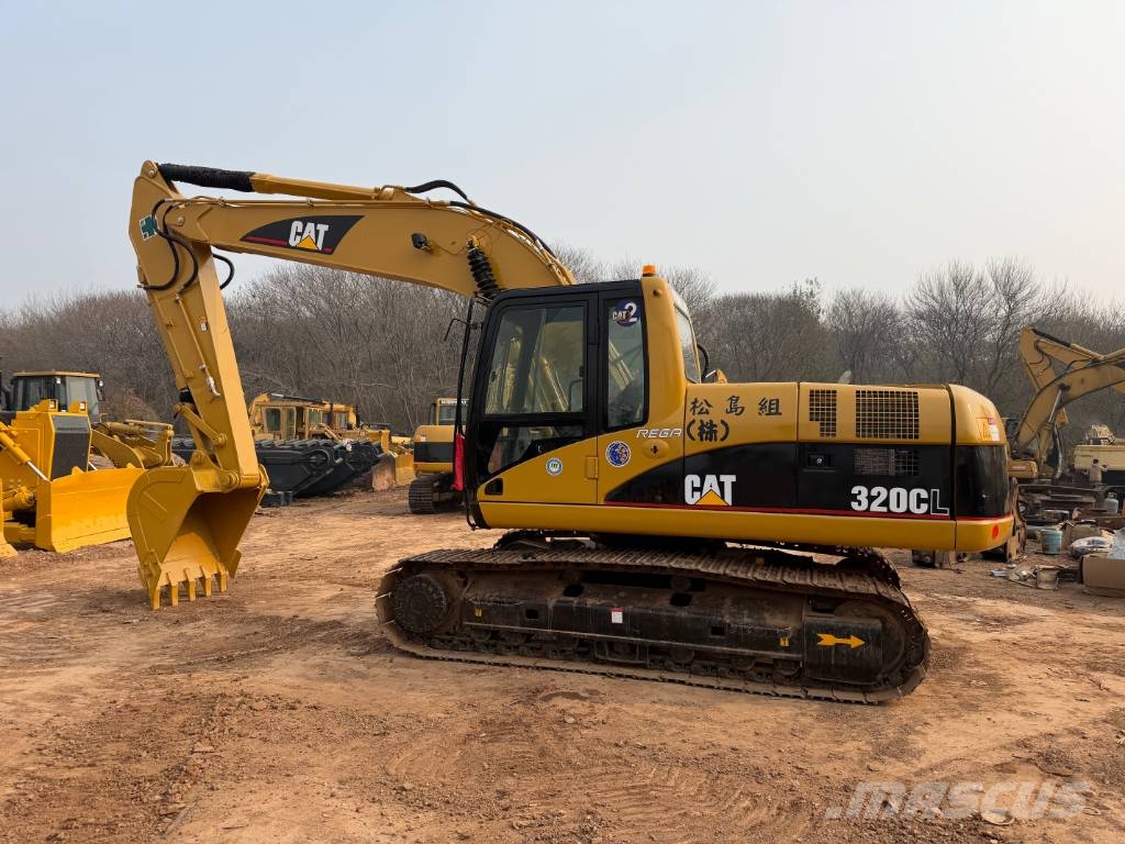 CAT 320 Гусеничні екскаватори