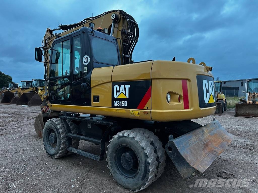CAT M 315 D 30Km full Hydr. Top Zustand German machine حفارات بعجل